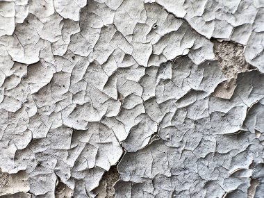 Old paint on the surface of an old concrete wall texture and background