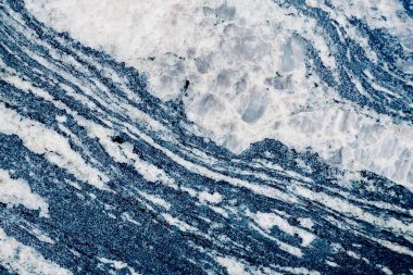 Doğal mermerin mavi, gri ve beyaz desenleri veya çizgileri ve renk dalgaları doğal ve akışkan görünmesini sağlar. Kalıbı karmaşık doku ve kara leke..