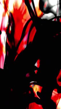 Suya renkli mürekkeplerle akan canlı renklere sahip soyut video. Kompozisyon mavi, kırmızı, yeşil ve sarı tonlarından oluşur. Hafif bir arkaplanda harmanlanır ve kıvrılır.