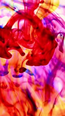 vdo Soyut Bulanık odak canlı renkler Renkli mürekkep ile akan suya yayılmış