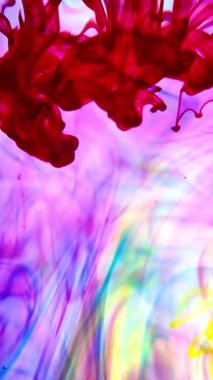 vdo Soyut Bulanık odak canlı renkler Renkli mürekkep ile akan suya yayılmış