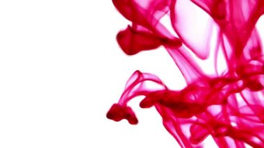 Suya renkli mürekkeplerle akan canlı renklere sahip soyut video. Kompozisyon mavi, kırmızı, yeşil ve sarı tonlarından oluşur. Hafif bir arkaplanda harmanlanır ve kıvrılır.