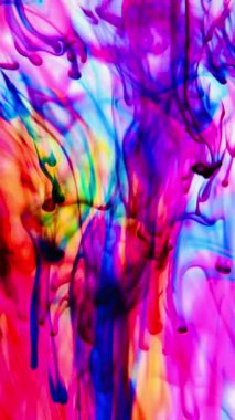 vdo Soyut Bulanık odak canlı renkler Renkli mürekkep ile akan suya yayılmış