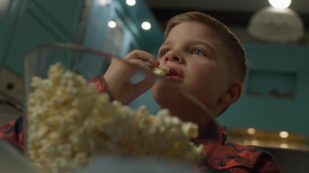 Boy Eats Popcorn Close Kid Watching Popcorn Sitting Living Room — Stock Video