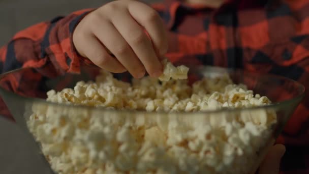 Kid Eating Popcorn Close Childs Hand Taking Popcorn Bowl — Stock Video
