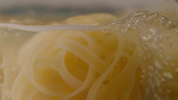 Cooking Pasta Close Water Bubbles Transparent Pot Fettuccine Pasta — Stock Video
