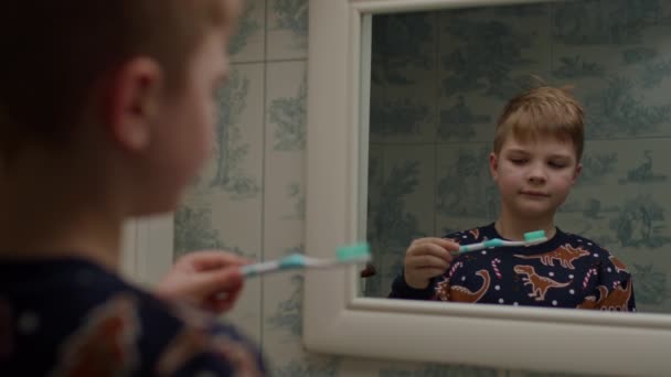 Boy Ready Brush His Teeth Looking Mirror Reflection — Vídeo de Stock