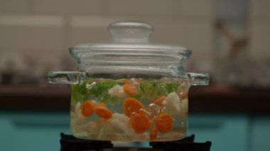 Vegs Cooking In Boiling Water in slow motion. 4K