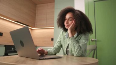 Tired Woman Closes Laptop. Exhausted mixed race female finishes her work. 4K