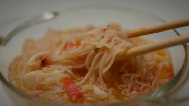 Noodle Eating Hand Mixing Quick Noodle Soup Chopsticks Close Slow — Stock Video