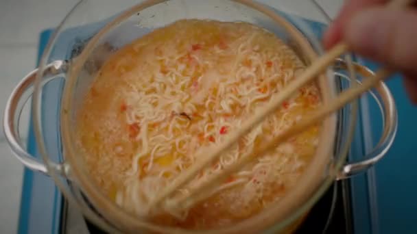 Hand Cooking Noodle Soup Mixing Noodle Soup Chopsticks Top View — Stock Video