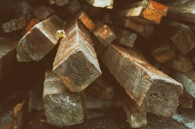 Stacked Pieces Of Old Plank Used In Construction