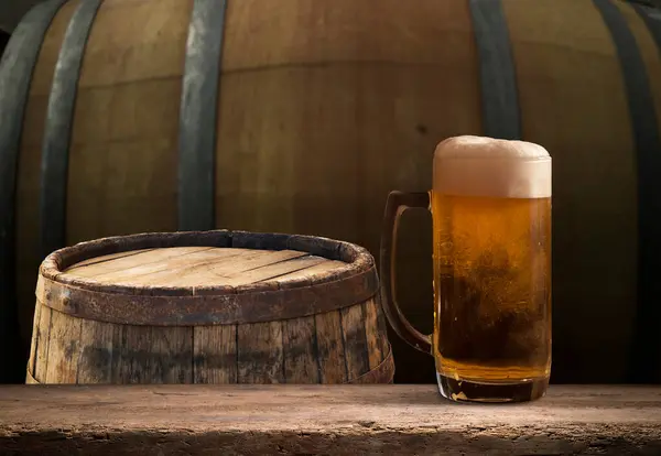 Beer barrel with beer glasses on table on wooden background. High quality photo