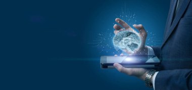 Businessman shows artificial intelligence on a blue background.