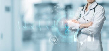 The doctor stands against the background of a virtual computer screen on a blurred background.