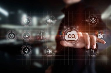 Man working with CO2 cleaning interface on virtual computer screen.