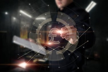 Business man drawing pound on virtual computer screen.