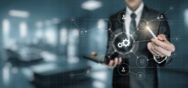 Manager works with business processes on a virtual computer screen.