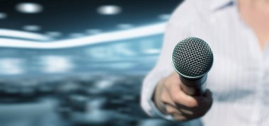 A journalist shows a microphone on a blurred studio background. clipart