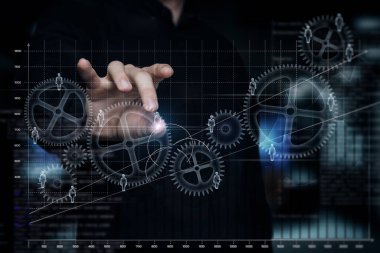 Bir yönetici ticaret sırasında bir grup işçiyi yönetir. Arayüzle sanal ekran üzerinde çalışan yönetici.