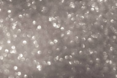 Beyaz bokeh ve kopyalama alanı ile odaklanmış arkaplan