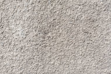 Sert beyaz desenli duvar, arka plan veya tasarım çalışmaları için uygun, düzensiz yüzeyinin detaylı bir yakın çekimini sağlar. Eşsiz yapı ve basitlik, yaratıcı projeler için idealdir..