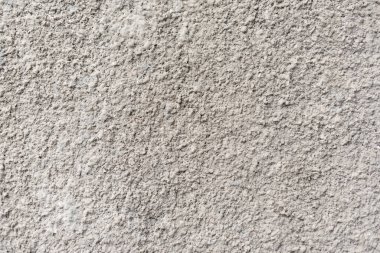 Sert beyaz desenli duvar, arka plan veya tasarım çalışmaları için uygun, düzensiz yüzeyinin detaylı bir yakın çekimini sağlar. Eşsiz yapı ve basitlik, yaratıcı projeler için idealdir..