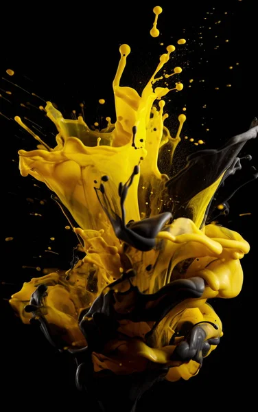 yellow ink and black ink color creating abstract explosion. Smooth texture, fast motion and splash. Creative & colourful studio isolation.