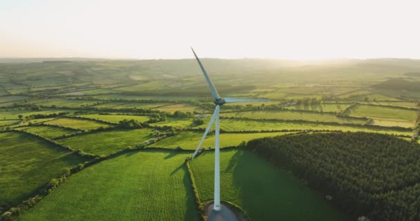 Aerial Large Wind Turbine Blades Backdrop Sunset Green Fields Aerial — Stock Video