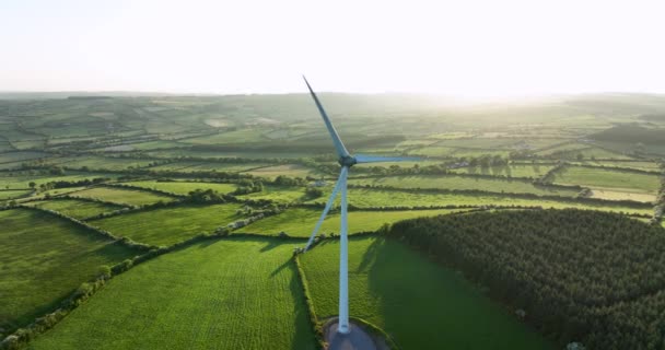 Aerial Large Wind Turbine Blades Backdrop Sunset Green Fields Aerial — Stock Video
