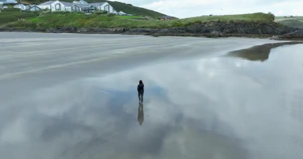 Aerial Woman Walks Deserted Sandy Beach Alone Woman Takes Picture — Stock Video