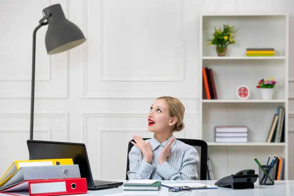 stock image secretary lovely cute blonde young girl in shirt in office with work load waving hands