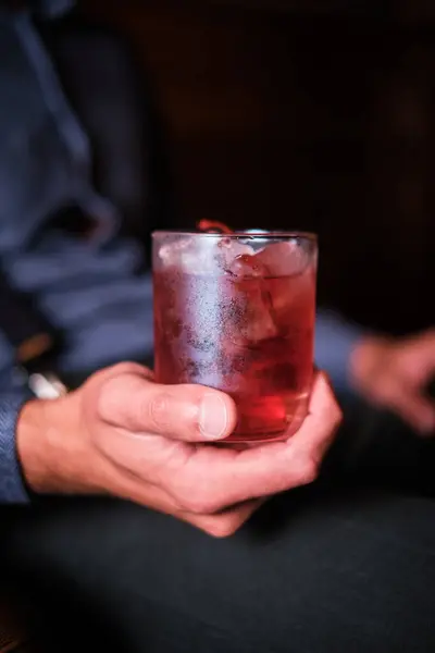 Close Image Capturing Moment Someone Holding Glass Cherry Cocktail Garnished — Stock Photo, Image