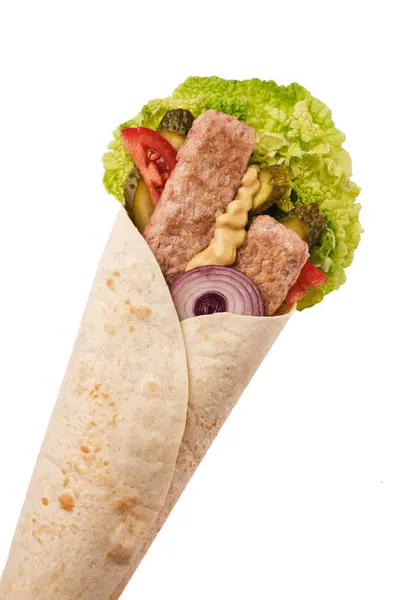 stock image A delicious wrap showcases a vibrant blend of crispy lettuce, juicy tomatoes, and savory meat, wrapped in soft tortilla, highlighting fresh ingredients for a nutritious meal.