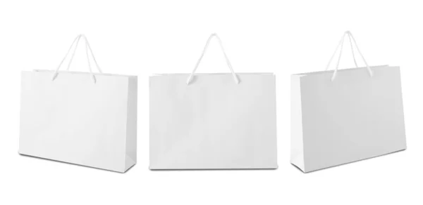 白い背景にクリッピングパスで隔離された白いショッピングバッグのセット — ストック写真