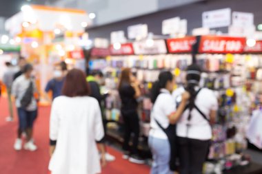 Sergi salonundaki soyut bulanık insanlar fuar fuarı geçmişi. İş fuarı, iş fuarı veya borsa.