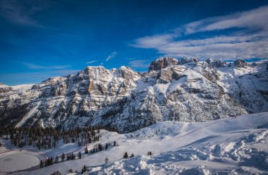 Famous Italian Alps Brenta Dolomites, snow on the slopes of the Alps Madonna di Campiglio, Pinzolo, Italy. Ski resorts in Italy. January 2023 clipart