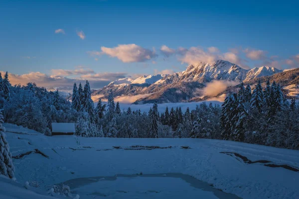 Stock image Alpenglow at sunset time on mountain peak at Nassfeld ski resort, Carinthia, Austria. January 2022