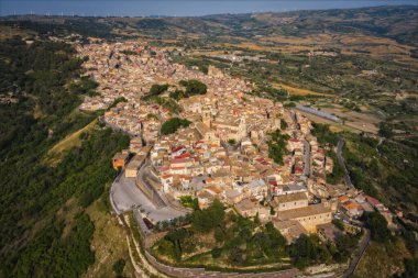 Panoramic aerial picture of Vizzini at sunset. Vizzini - picturesque Italian city in Sicily. June 2023 clipart