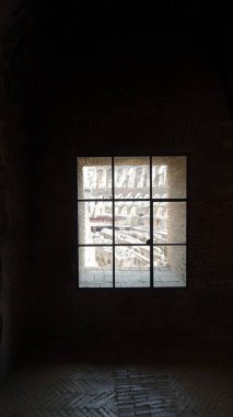 Rome, Italy, June 23 2021. A glimpse of the amphitheater arena from a window of the Colosseum.