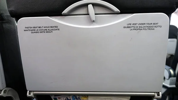 Back Airplane Seat Written Warnings — Stock Photo, Image