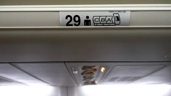 Sign Indicating Seating Fuselage Airliner — Stock Photo, Image
