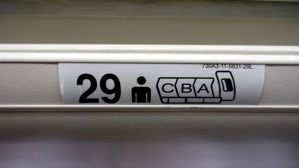 Sign Indicating Seating Fuselage Airliner — Stock Photo, Image