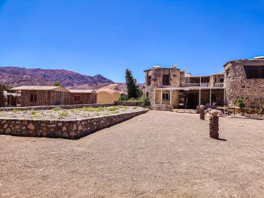 Cottage in a Bedouin Camp on the Sea in Ras Shitan in Oasis in Sinai, Taba desert with the Background of the Sea and Mountains.