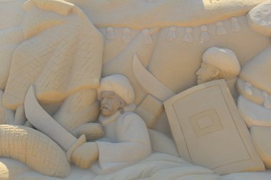 Sculptures made of sand for famous historical and ancient figures clipart