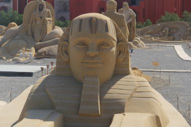 Sculptures made of sand for famous historical and ancient figures clipart