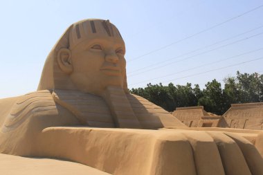 Sculptures made of sand for famous historical and ancient figures clipart