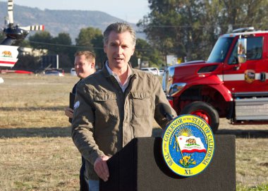 Napa, CA - Nov 17, 2022: Governor Gavin Newsom speaking at a Press Conference to highlight wildfire investments and seasonal conditions in California clipart