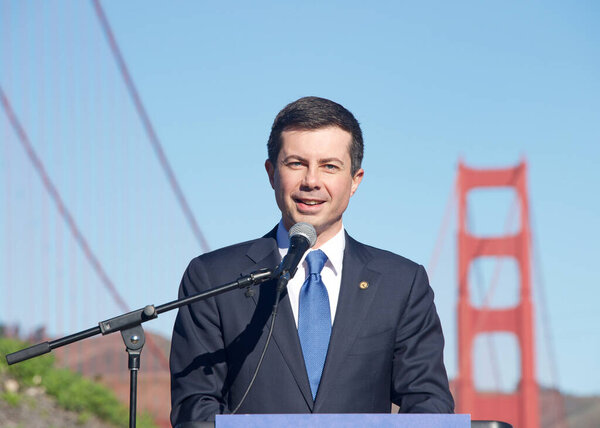 San Francisco, CA - Jan 23, 2023: Transportation Secretary Pete Buttigieg speaking at a Press Conf in front of the GGB. Highlighting the fed governments investments in infrastructure.