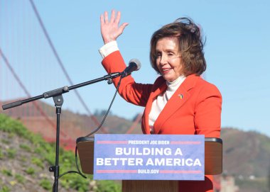San Francisco, CA - Jan 23, 2023: Former Speaker, Congresswoman Nancy Pelosi at a Press Conf in front of the GGB. Highlighting the fed governments investments in infrastructure clipart